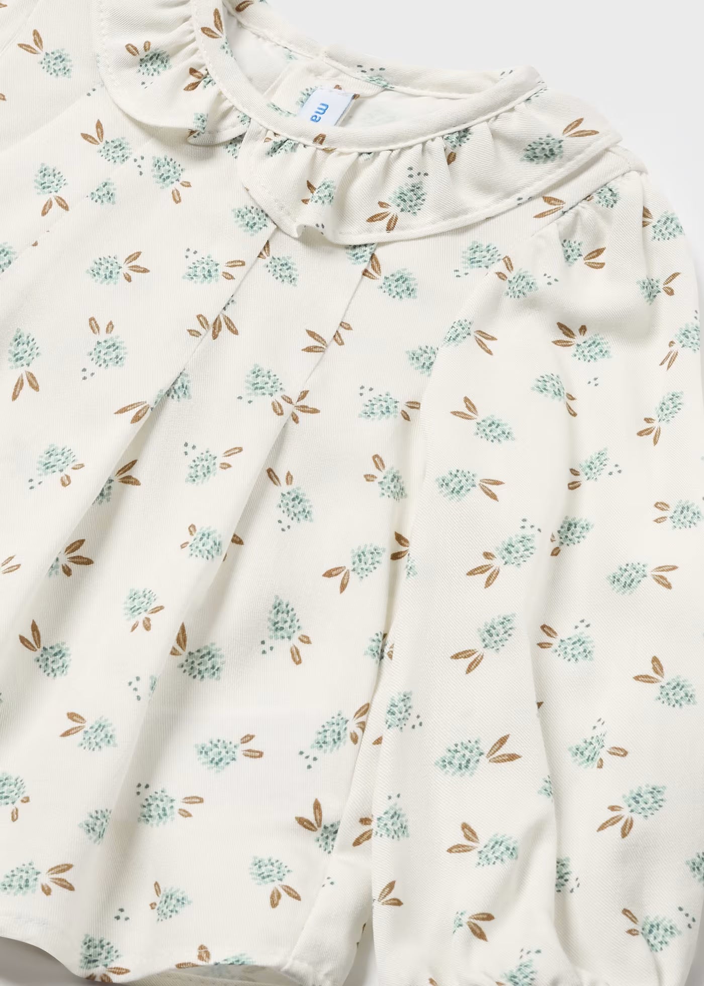 Blusa flores cuello olán