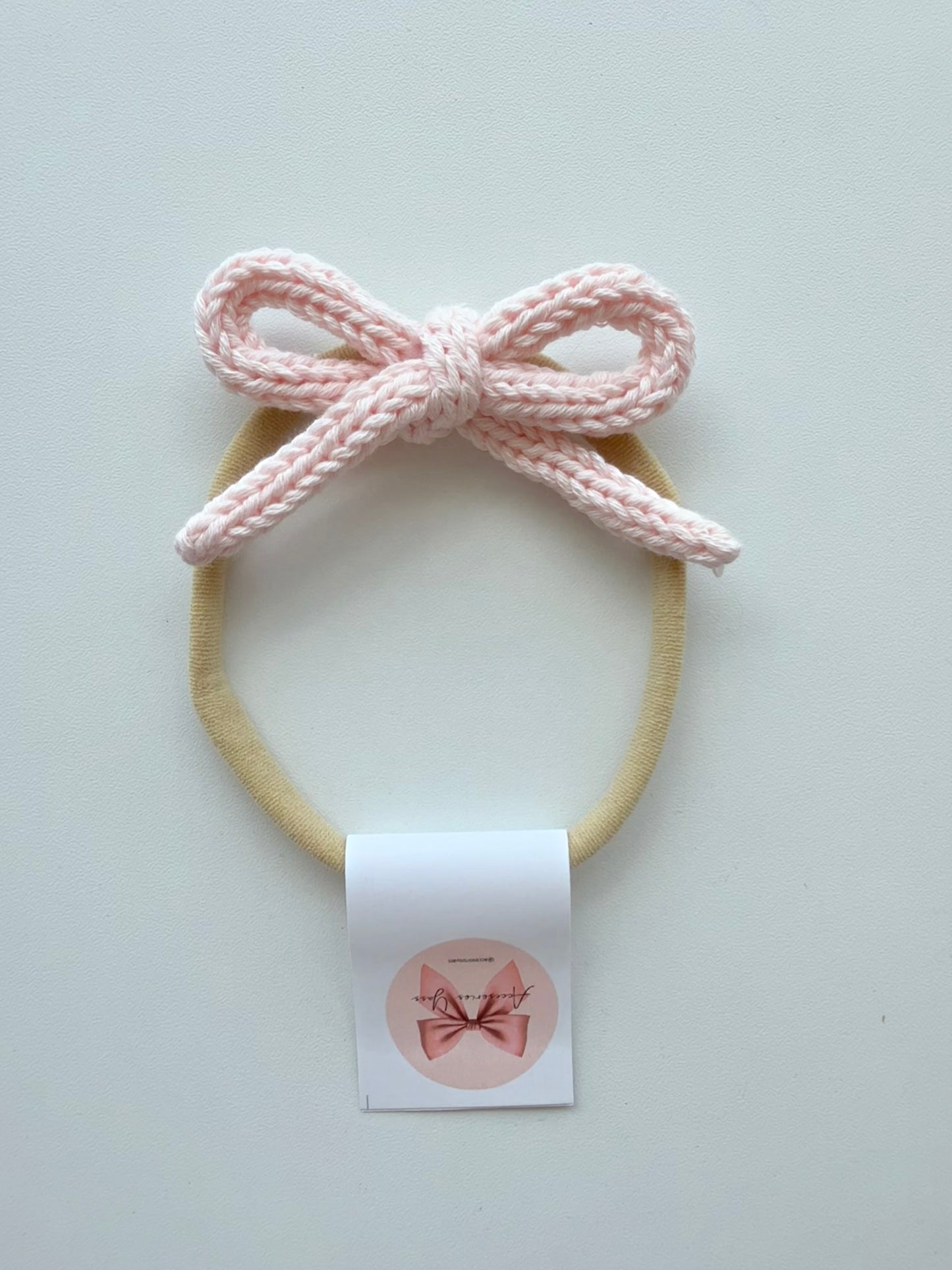 Banditas de cordón tejido tonos rosa