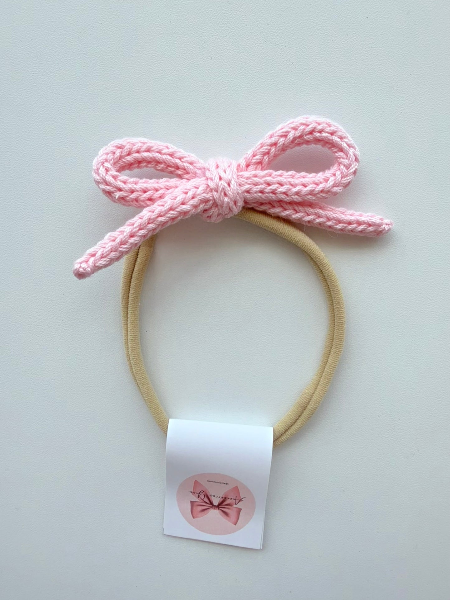 Banditas de cordón tejido tonos rosa