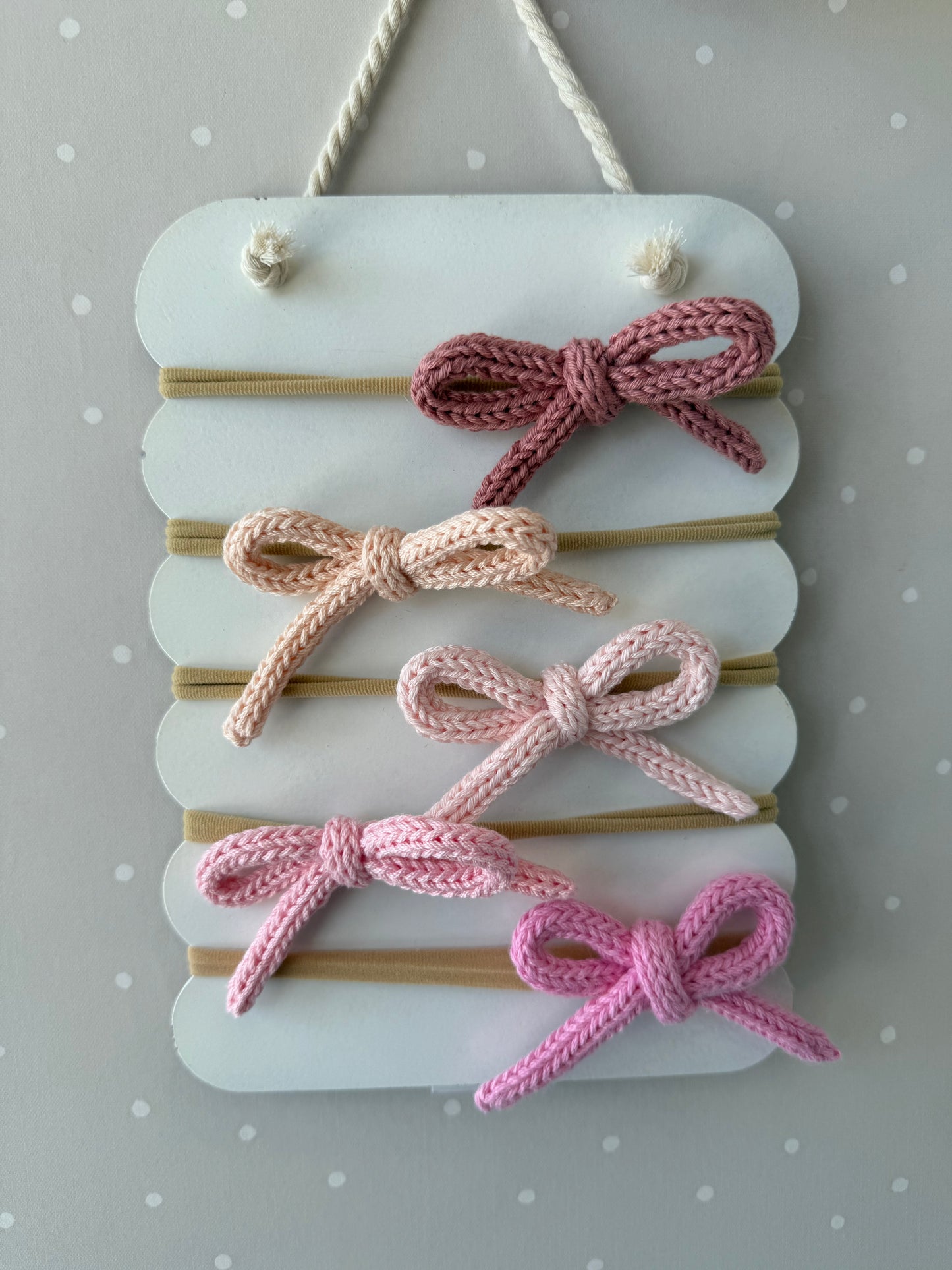 Banditas de cordón tejido tonos rosa